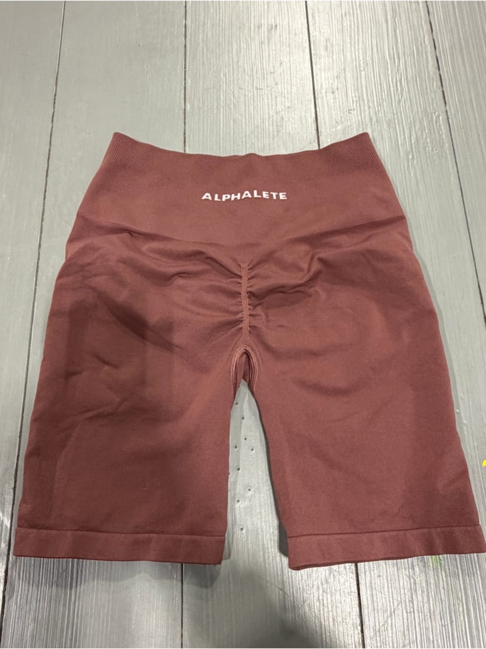 Alphalete High-Rise Bike Shorts in Burgundy